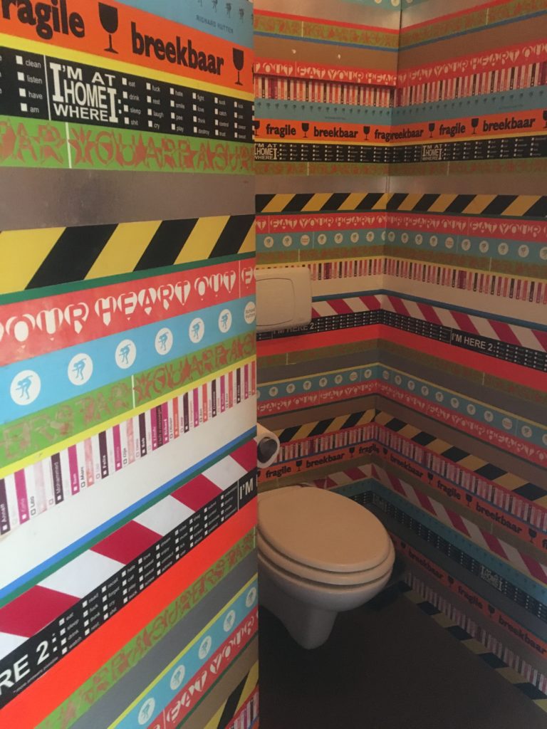 Walls decorated with pieces different tapes designed for particular purposes