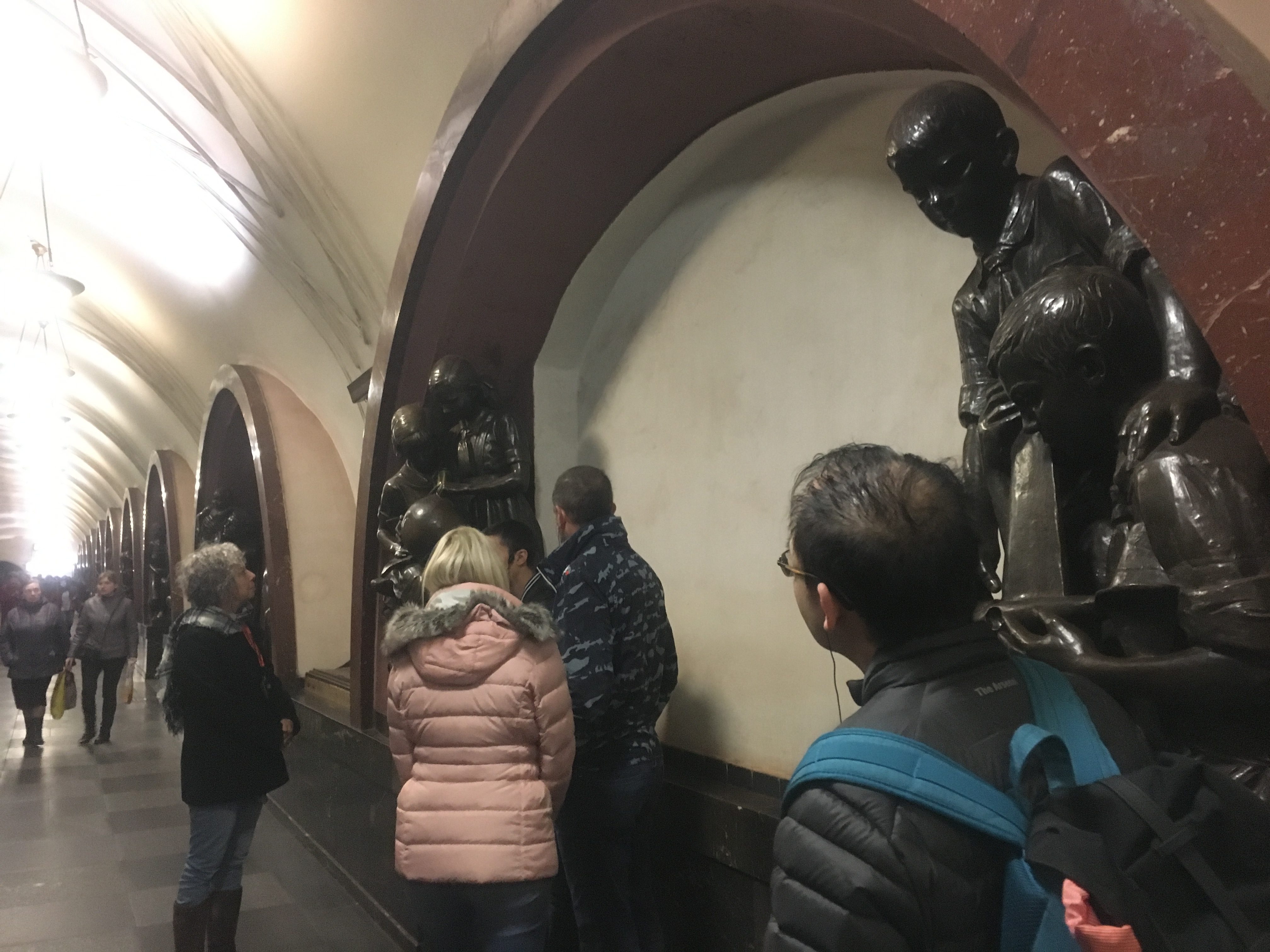 Family sculptures in Revolution Square Station Moscow