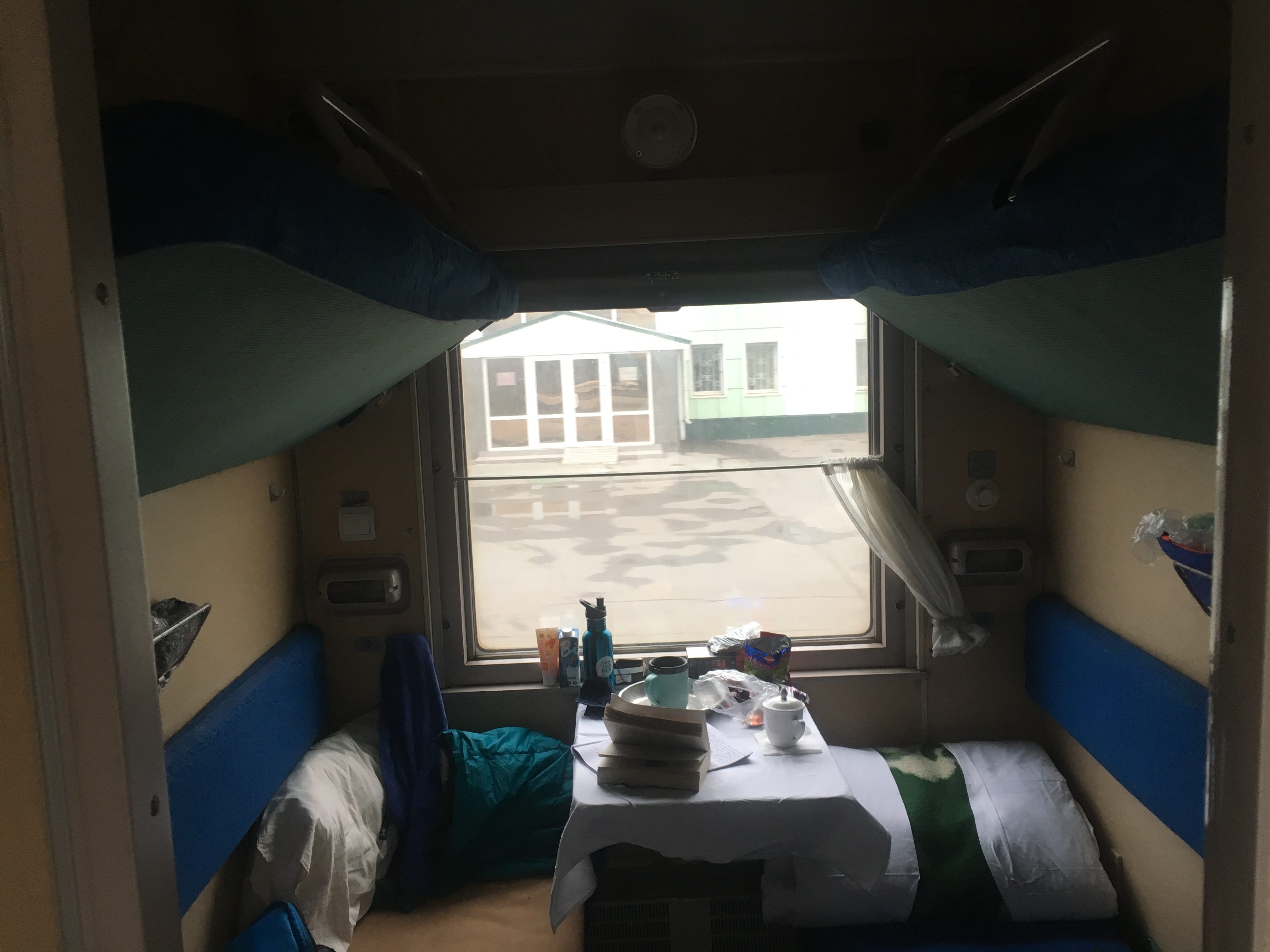 Still at Omsk, my nest on the left. Anton's neat bedding roll on the right