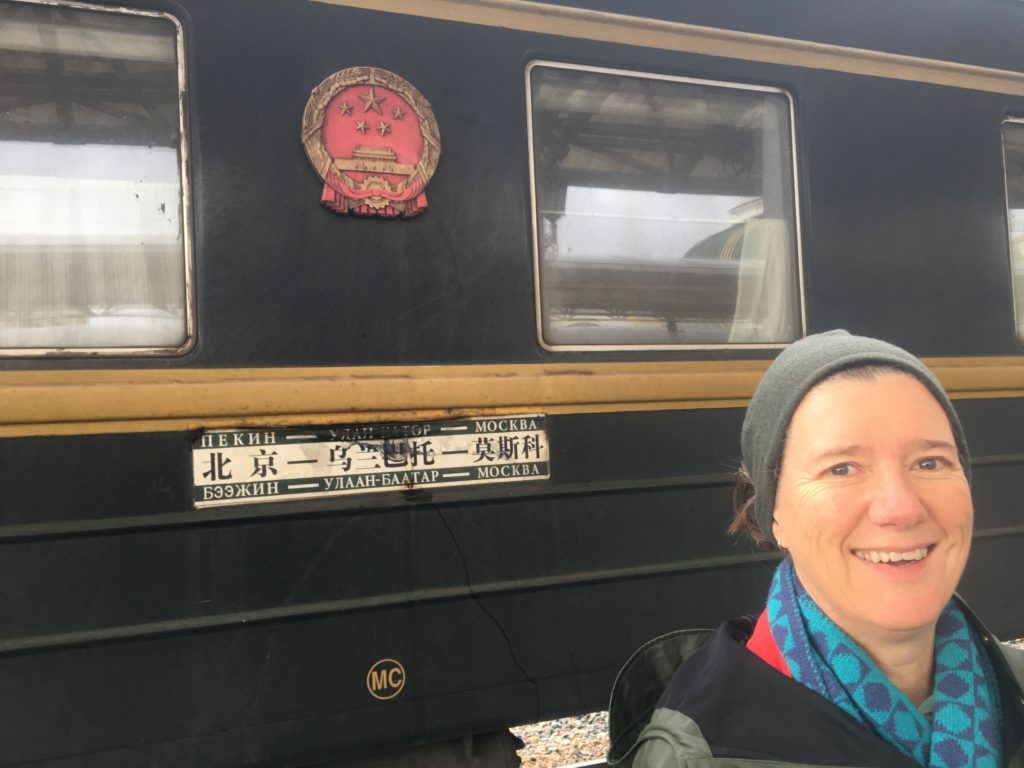 Victoria outside Chinese carriage on the TransSiberian/transMongolian Railway