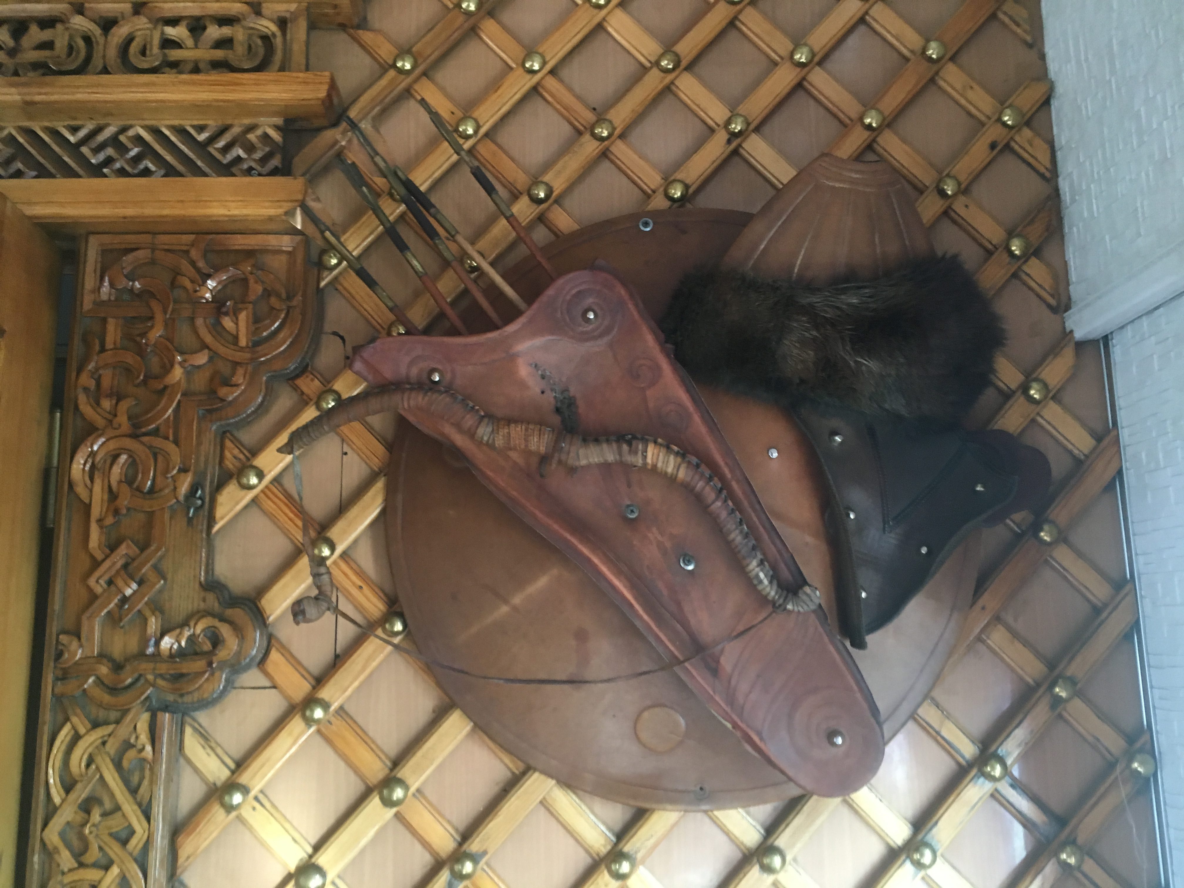Mongolian bow and arrows, hat and shield; restaurant decoration