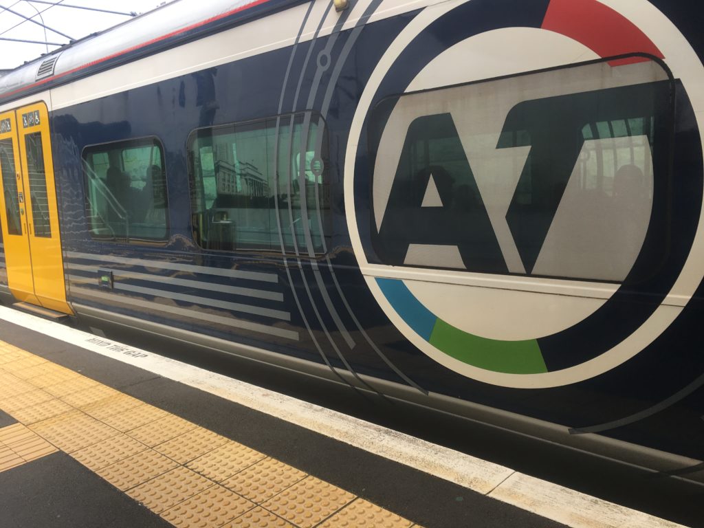 Suburban Auckland train arrives at Grafton Train Station 