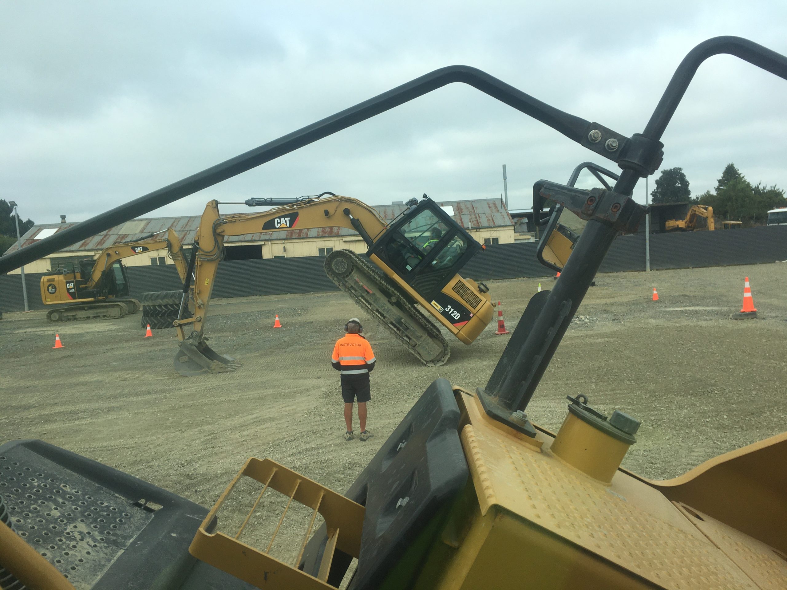 My son in the other digger doing a 'handstand' at Dig This, Invercargill