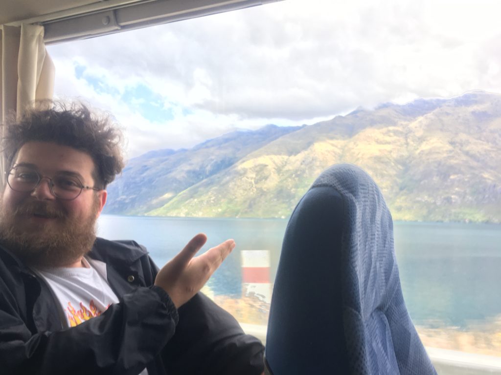 Felix points to the beautiful Lake Wakatipu as we draw closer to Queenstown