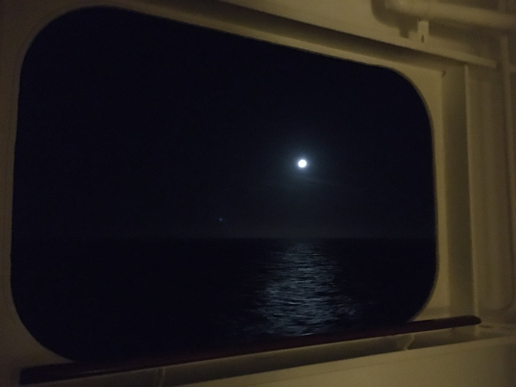 April full moon over African waters seen from QM2