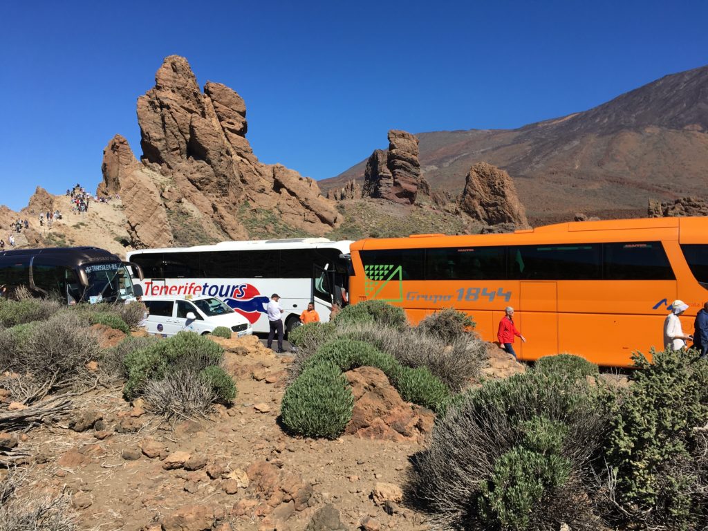 Buses parked in the caldera below the slopes of Mount Teide, Tenerife