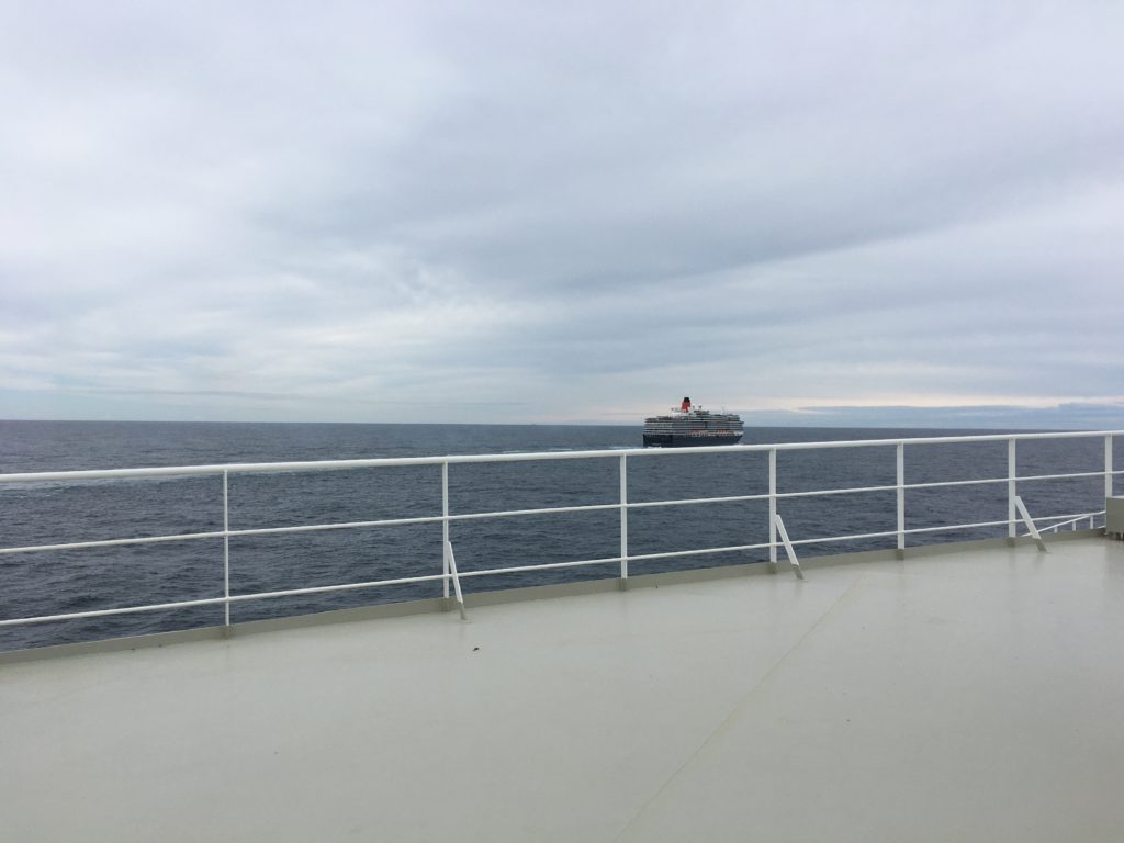 Queen Victoria on the horizon as seen from QM2